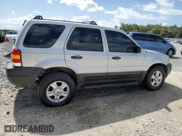 ✅ 2003 Ford Escape XLT Popular • VIN: 1FMYU03193KA69270 • Lot: 85519935. Listed on Copart with 143,614 mi. Free auction sales archive from the USA and detailed vehicle history report at DreamBid. Image 3.