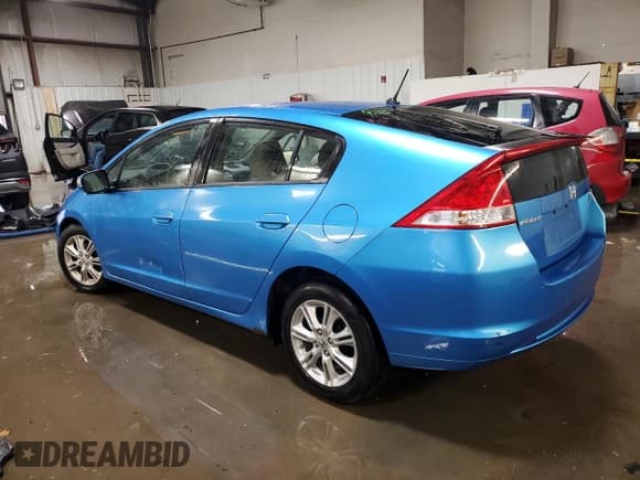 ✅ 2010 Honda Insight EX • VIN: JHMZE2H73AS036498 • Lot: 93460445. Listed on Copart with 134,324 mi. Free auction sales archive from the USA and detailed vehicle history report at DreamBid. Image 2.