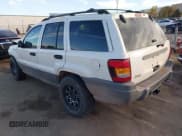 ✅ 2002 Jeep Grand Cherokee Laredo • VIN: 1J4GX48N82C186688 • Lot: 43657283. Listed on IAAI with 214,970 mi. Free auction sales archive from the USA and detailed vehicle history report at DreamBid. Image 3.