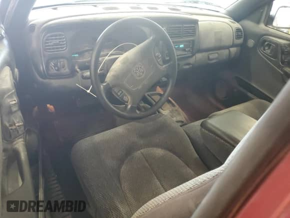 1999 Dodge Dakota SLT z VIN 1B7GG22X0XS197699, wystawiony jako Copart lot #61057935 z przebiegiem 147 833 mil mil oraz Szkoda całkowita • Salvage title. Historia ofert i sprzedaży dostępna na DreamBid. Obrazek 8.