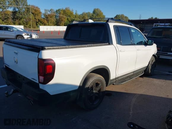 ✅ 2023 Honda Ridgeline Black Edition • VIN: 5FPYK3F85PB037754 • Лот: 43438858. Опубликован ранее на IAAI с пробегом 40 793 миль. Бесплатный доступ к архиву аукционных продаж из США и подробный отчёт об истории автомобиля на DreamBid. Изображение 4.