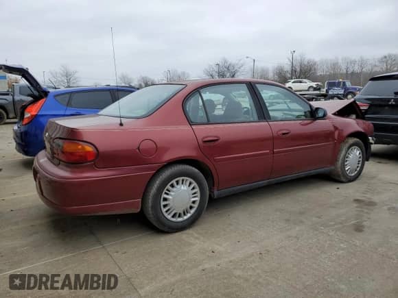 2003 Chevrolet Malibu with VIN 1G1ND52J13M696712, listed as a Copart auction lot 86052984 with 81,635 mi miles and Salvage title. Bid and sale history available at DreamBid. Image 3.