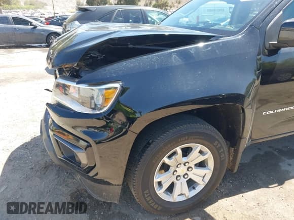 ✅ 2021 Chevrolet Colorado 2WD LT • VIN: 1GCGSCEN2M1142381 • Lot: 42384837. Listed on IAAI with 97,617 mi. Free auction sales archive from the USA and detailed vehicle history report at DreamBid. Image 6.