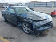 ✅ 2012 Chevrolet Camaro 2LT • VIN: 2G1FC1E30C9154964 • Lot: 42062902. Listed on IAAI with 140,266 mi. Free auction sales archive from the USA and detailed vehicle history report at DreamBid. Image 1.