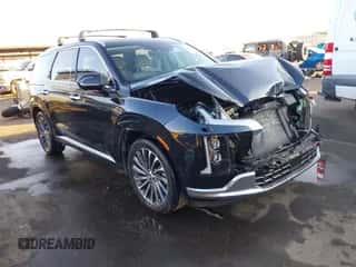 2023 Hyundai Palisade Calligraphy z VIN KM8R74GE6PU537689, wystawiony jako IAAI lot #41151656 z przebiegiem 23 392 mil mil oraz . Historia ofert i sprzedaży dostępna na DreamBid. Obrazek 1.