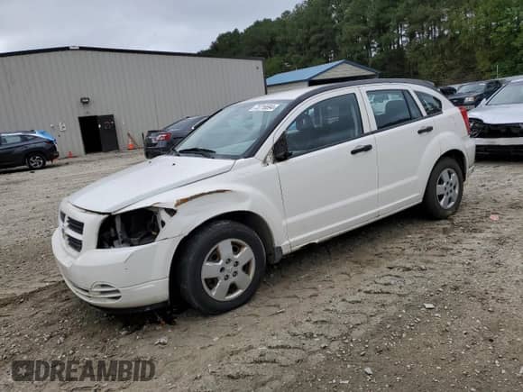 2007 Dodge Caliber with VIN 1B3HB28B87D218447, listed as a Copart auction lot 73716694 with 173,201 mi miles and Salvage title. Bid and sale history available at DreamBid. Image 1.