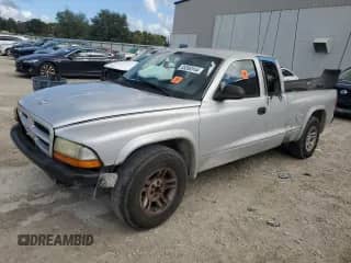 2003 Dodge Dakota with VIN 1D7HL12X33S110095, listed as a Copart auction lot 85368144 with 266,609 mi miles and Salvage title. Bid and sale history available at DreamBid. Image 1.