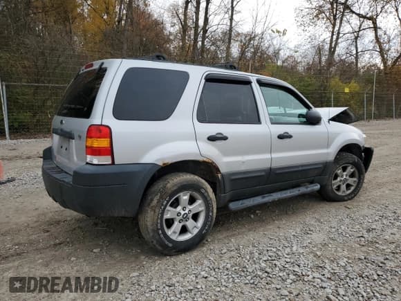 ✅ 2005 Ford Escape XLT • VIN: 1FMYU03175KE32913 • Lot: 90811865. Listed on Copart with Not provided. Free auction sales archive from the USA and detailed vehicle history report at DreamBid. Image 3.