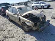 ✅ 2003 Kia Optima LX • VIN: KNAGD126635214280 • Лот: 77695004. Опубликован ранее на Copart с пробегом Не указан. Бесплатный доступ к архиву аукционных продаж из США и подробный отчёт об истории автомобиля на DreamBid. Изображение 4.