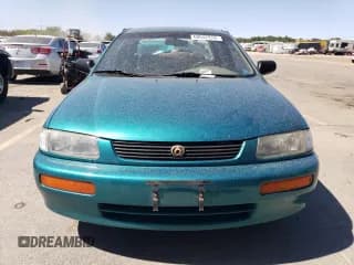 ✅ 1995 Mazda Protege • VIN: JM1BA1412S0107309 • Lot: 68042974. Wystawiony na Copart z przebiegiem 112 496 mil. Bezpłatny archiwum sprzedaży aukcyjnych z USA i szczegółowy raport historii pojazdu na DreamBid. Zdjęcie 5.