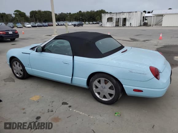 ✅ 2003 Ford Thunderbird Deluxe • VIN: 1FAHP60A93Y102015 • Lot: 75091754. Wystawiony na Copart z przebiegiem Nie podano. Bezpłatny archiwum sprzedaży aukcyjnych z USA i szczegółowy raport historii pojazdu na DreamBid. Zdjęcie 2.