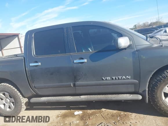 ✅ 2005 Nissan Titan LE • VIN: 1N6AA07B65N501054 • Lot: 41728466. Listed on IAAI with 318,859 mi. Free auction sales archive from the USA and detailed vehicle history report at DreamBid. Image 13.