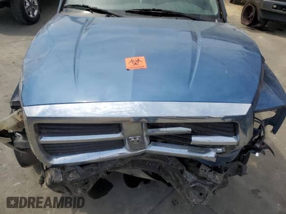 2005 Dodge Dakota ST z VIN 1D7HW28K85S168893, wystawiony jako Copart lot #69955454 z przebiegiem Nie podano mil oraz Szkoda całkowita • Salvage title. Historia ofert i sprzedaży dostępna na DreamBid. Obrazek 12.