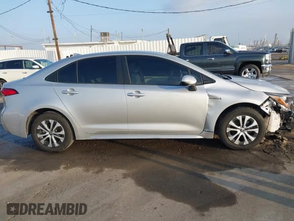 ✅ 2021 Toyota Corolla Hybrid LE • VIN: JTDEAMDE8MJ019296 • Лот: 43549161. Опубликован ранее на IAAI с пробегом 34 680 миль. Бесплатный доступ к архиву аукционных продаж из США и подробный отчёт об истории автомобиля на DreamBid. Изображение 14.