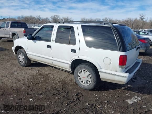✅ 1996 GMC Jimmy SL • VIN: 1GKDT13W8T2522192 • Lot: 41439548. Wystawiony na IAAI z przebiegiem 262 152 mil. Bezpłatny archiwum sprzedaży aukcyjnych z USA i szczegółowy raport historii pojazdu na DreamBid. Zdjęcie 3.