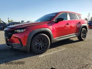 ✅ 2024 Mazda CX-50 S Premium • VIN: 7MMVABDMXRN217714 • Lot: 90884395. Listed on Copart with 6,518 mi. Free auction sales archive from the USA and detailed vehicle history report at DreamBid. Image 1.