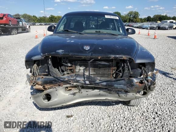 2000 Dodge Dakota Sport z VIN 1B7GG26N7YS667611, wystawiony jako Copart lot #71181355 z przebiegiem 218 471 mil mil oraz Szkoda całkowita • Salvage title. Historia ofert i sprzedaży dostępna na DreamBid. Obrazek 5.