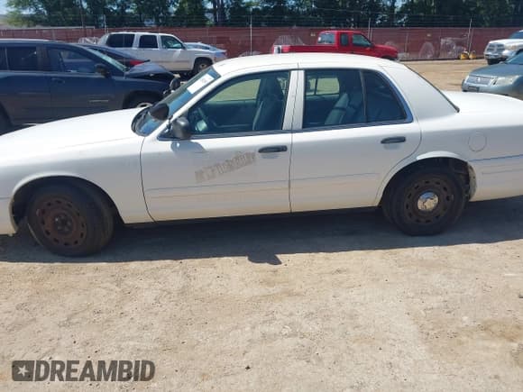 ✅ 2003 Ford Police Interceptor Street Appear • VIN: 2FAHP71W23X179762 • Lot: 42802650. Listed on IAAI with 107,635 mi. Free auction sales archive from the USA and detailed vehicle history report at DreamBid. Image 14.