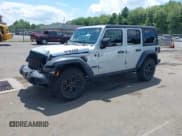 ✅ 2023 Jeep Wrangler Sport S • VIN: 1C4HJXDN2PW615882 • Lot: 42791138. Listed on IAAI with 21,993 mi. Free auction sales archive from the USA and detailed vehicle history report at DreamBid. Image 2.
