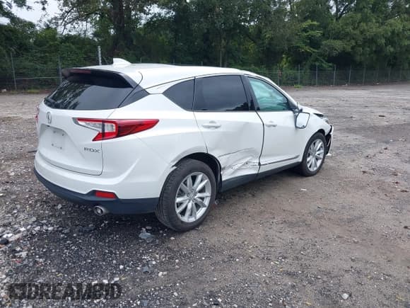 ✅ 2021 Acura RDX • VIN: 5J8TC1H33ML010603 • Lot: 43063515. Listed on IAAI with 54,861 mi. Free auction sales archive from the USA and detailed vehicle history report at DreamBid. Image 4.