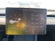 ✅ 2023 Tesla Model Y Long Range • VIN: 7SAYGDEE5PF765326 • Lot: 41757113. Listed on IAAI with 10,461 mi. Free auction sales archive from the USA and detailed vehicle history report at DreamBid. Image 19.