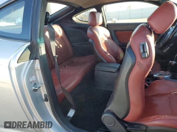 ✅ 2008 Hyundai Tiburon GT • VIN: KMHHN66F68U270322 • Лот: 85873875. Опубликован ранее на Copart с пробегом 181 595 миль. Бесплатный доступ к архиву аукционных продаж из США и подробный отчёт об истории автомобиля на DreamBid. Изображение 10.