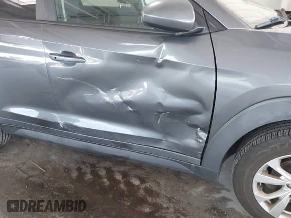 2019 Hyundai Tucson Value with VIN KM8J33A4XKU862390, listed as a IAAI auction lot 42769145 with 119,632 mi miles and . Bid and sale history available at DreamBid. Image 6.