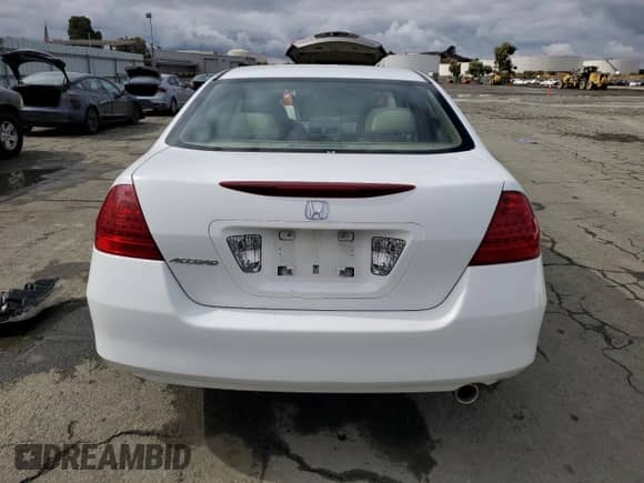 2006 Honda Accord LX с VIN 1HGCM56456A107185, выставлен на аукционе Copart как лот 82542485 с пробегом 102 502 миль миль и Списание • Salvage title. История ставок и продаж доступна на DreamBid. Изображение 6.