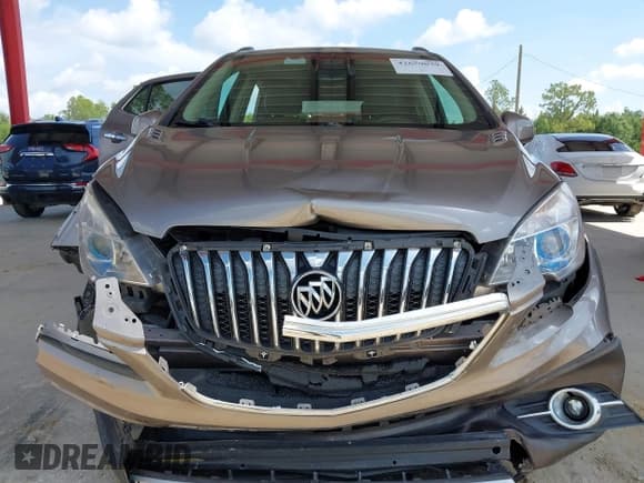 ✅ 2013 Buick Encore Leather • VIN: KL4CJGSB8DB206611 • Lot: 42659039. Listed on IAAI with 99,717 mi. Free auction sales archive from the USA and detailed vehicle history report at DreamBid. Image 13.