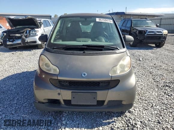 ✅ 2009 Smart fortwo Pure • VIN: WMEEJ31X79K275514 • Lot: 86159415. Wystawiony na Copart z przebiegiem 117 713 mil. Bezpłatny archiwum sprzedaży aukcyjnych z USA i szczegółowy raport historii pojazdu na DreamBid. Zdjęcie 5.