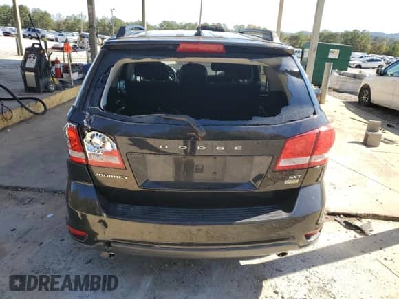 2012 Dodge Journey SXT с VIN 3C4PDCBG4CT289938, выставлен на аукционе Copart как лот 82733135 с пробегом 157 760 миль миль и Списание • Salvage title. История ставок и продаж доступна на DreamBid. Изображение 6.