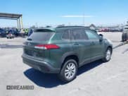 ✅ 2023 Toyota Corolla Cross LE • VIN: 7MUCAAAG3PV042624 • Lot: 42506895. Listed on IAAI with 28,039 mi. Free auction sales archive from the USA and detailed vehicle history report at DreamBid. Image 4.