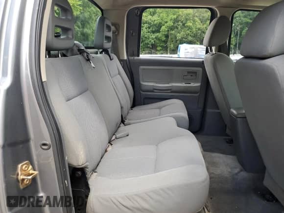 2006 Dodge Dakota SLT с VIN 1D7HE48K06S522552, выставлен на аукционе Copart как лот 67614475 с пробегом 208 801 миль миль и Списание • Salvage title. История ставок и продаж доступна на DreamBid. Изображение 10.