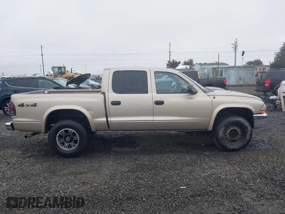✅ 2004 Dodge Dakota SLT • VIN: 1D7HG48NX4S596370 • Lot: 41760565. Listed on IAAI with 232,409 mi. Free auction sales archive from the USA and detailed vehicle history report at DreamBid. Image 14.