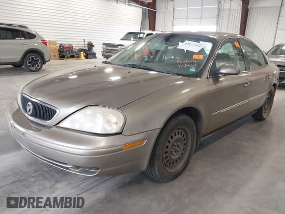 ✅ 2002 Mercury Sable GS • VIN: 1MEFM50U62G621153 • Lot: 42127554. Listed on IAAI with 159,053 mi. Free auction sales archive from the USA and detailed vehicle history report at DreamBid. Image 2.