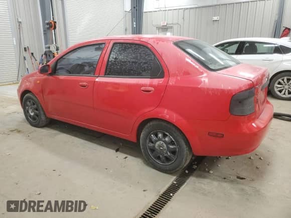 2004 Chevrolet Aveo LS z VIN KL1TJ52614B258568, wystawiony jako Copart lot #84412874 z przebiegiem 150 051 mil mil oraz Czysty tytuł • Clean title. Historia ofert i sprzedaży dostępna na DreamBid. Obrazek 2.