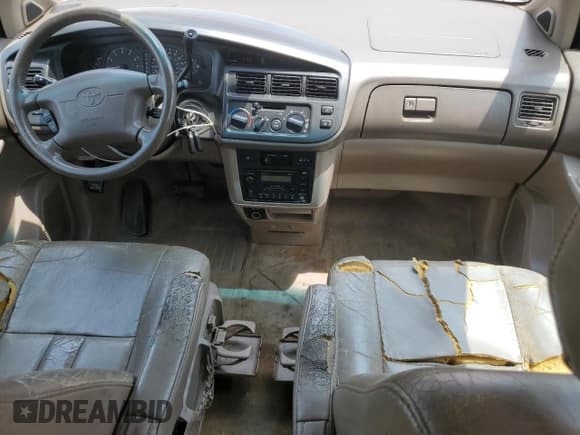 ✅ 1999 Toyota Sienna LE • VIN: 4T3ZF13C1XU158080 • Lot: 65145525. Listed on Copart with 181,543 mi. Free auction sales archive from the USA and detailed vehicle history report at DreamBid. Image 8.