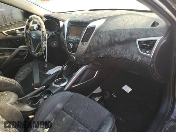 2014 Hyundai Veloster с VIN KMHTC6AD4EU183780, выставлен на аукционе Copart как лот 75121974 с пробегом Не указан миль и Списание • Salvage title. История ставок и продаж доступна на DreamBid. Изображение 8.