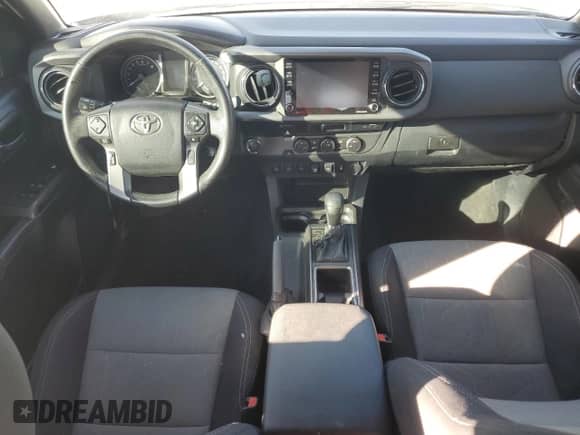 2022 Toyota Tacoma SR5 с VIN 3TMAZ5CN3NM171229, выставлен на аукционе Copart как лот 87084795 с пробегом Не указан миль и Чистый • Clean title. История ставок и продаж доступна на DreamBid. Изображение 8.