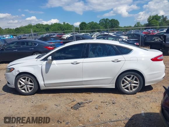 ✅ 2016 Ford Fusion SE • VIN: 1FA6P0H70G5108810 • Лот: 42191871. Опубликован ранее на IAAI с пробегом 169 700 миль. Бесплатный доступ к архиву аукционных продаж из США и подробный отчёт об истории автомобиля на DreamBid. Изображение 13.