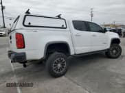 ✅ 2018 Chevrolet Colorado 4WD ZR2 • VIN: 1GCPTEE1XJ1105919 • Lot: 43081875. Listed on Copart with 122,345 mi. Free auction sales archive from the USA and detailed vehicle history report at DreamBid. Image 3.