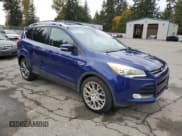 ✅ 2015 Ford Escape Titanium • VIN: 1FMCU0J96FUA14965 • Lot: 90305205. Listed on Copart with 186,714 mi. Free auction sales archive from the USA and detailed vehicle history report at DreamBid. Image 4.