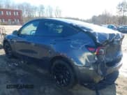 ✅ 2023 Tesla Model Y Long Range • VIN: 7SAYGAEE9PF905943 • Lot: 41444255. Listed on IAAI with 11,179 mi. Free auction sales archive from the USA and detailed vehicle history report at DreamBid. Image 3.