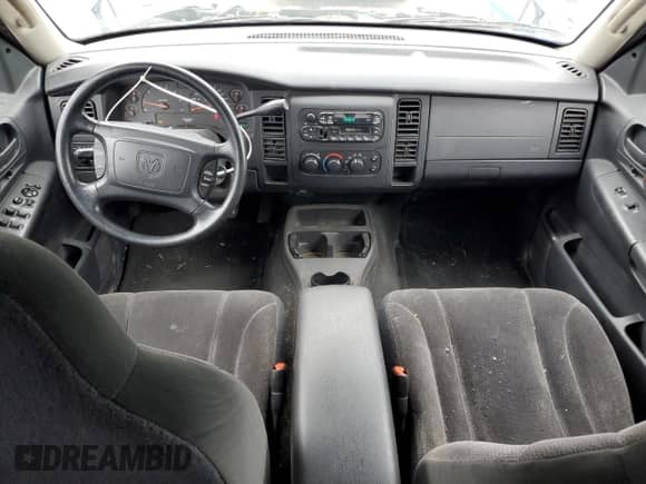 2002 Dodge Dakota SLT z VIN 1B7HL48X72S542402, wystawiony jako Copart lot #52707045 z przebiegiem 56 922 mil mil oraz Czysty tytuł • Clean title. Historia ofert i sprzedaży dostępna na DreamBid. Obrazek 8.