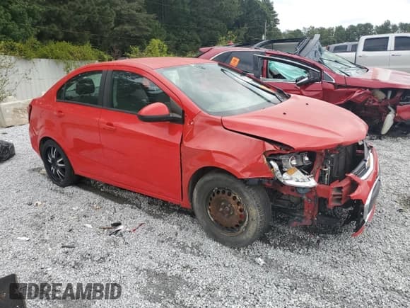 ✅ 2017 Chevrolet Sonic LS • VIN: 1G1JB5SH5H4135986 • Lot: 84257255. Listed on Copart with 192,655 mi. Free auction sales archive from the USA and detailed vehicle history report at DreamBid. Image 4.