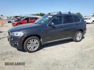 ✅ 2016 BMW X5 xDrive40e • VIN: 5UXKT0C56G0S77817 • Лот: 81701655. Опубликован ранее на Copart с пробегом 118 394 миль. Бесплатный доступ к архиву аукционных продаж из США и подробный отчёт об истории автомобиля на DreamBid. Изображение 1.