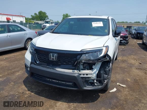 ✅ 2021 Honda Passport EX-L • VIN: 5FNYF8H59MB007097 • Lot: 42409181. Listed on IAAI with 74,410 mi. Free auction sales archive from the USA and detailed vehicle history report at DreamBid. Image 6.