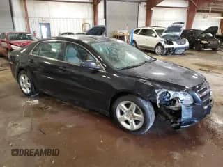 ✅ 2012 Chevrolet Malibu 1LS • VIN: 1G1ZB5E03CF174260 • Lot: 76026704. Listed on Copart with 25,469 mi. Free auction sales archive from the USA and detailed vehicle history report at DreamBid. Image 4.