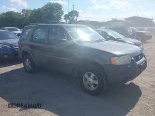 ✅ 2002 Ford Escape XLS Value • VIN: 1FMYU01B32KD20469 • Lot: 42553573. Wystawiony na IAAI z przebiegiem 353 752 mil. Bezpłatny archiwum sprzedaży aukcyjnych z USA i szczegółowy raport historii pojazdu na DreamBid. Zdjęcie 1.