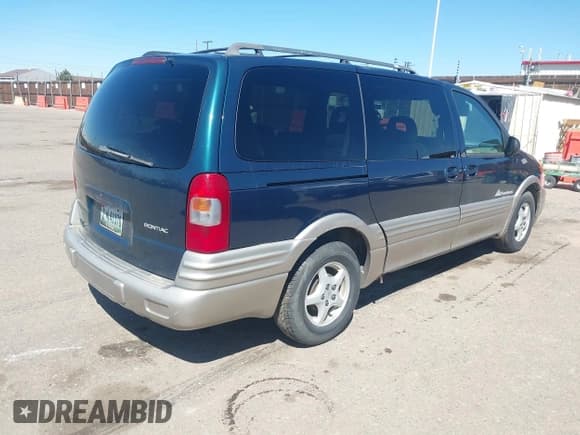 ✅ 1999 Pontiac Montana • VIN: 1GMDX03E0XD166084 • Лот: 41872976. Опубликован ранее на IAAI с пробегом 196 027 миль. Бесплатный доступ к архиву аукционных продаж из США и подробный отчёт об истории автомобиля на DreamBid. Изображение 4.